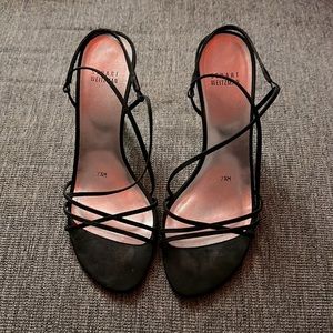 Excellent used condition vintage Stuart Weitzman black strappy heels. Size 7 1/2